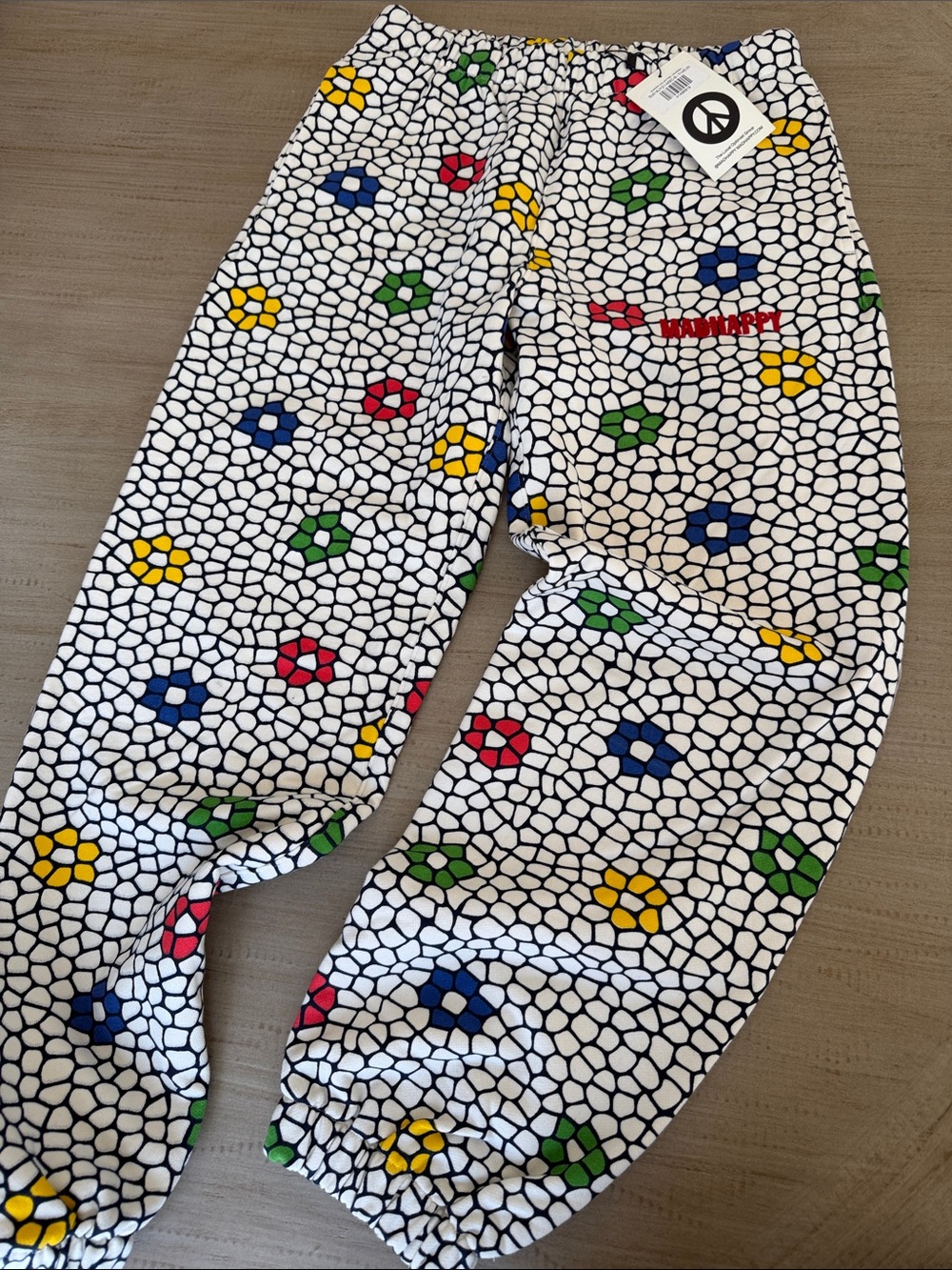 Madhappy White Floral-Print Mosaic Sweat Pants with Multicolor Flowers